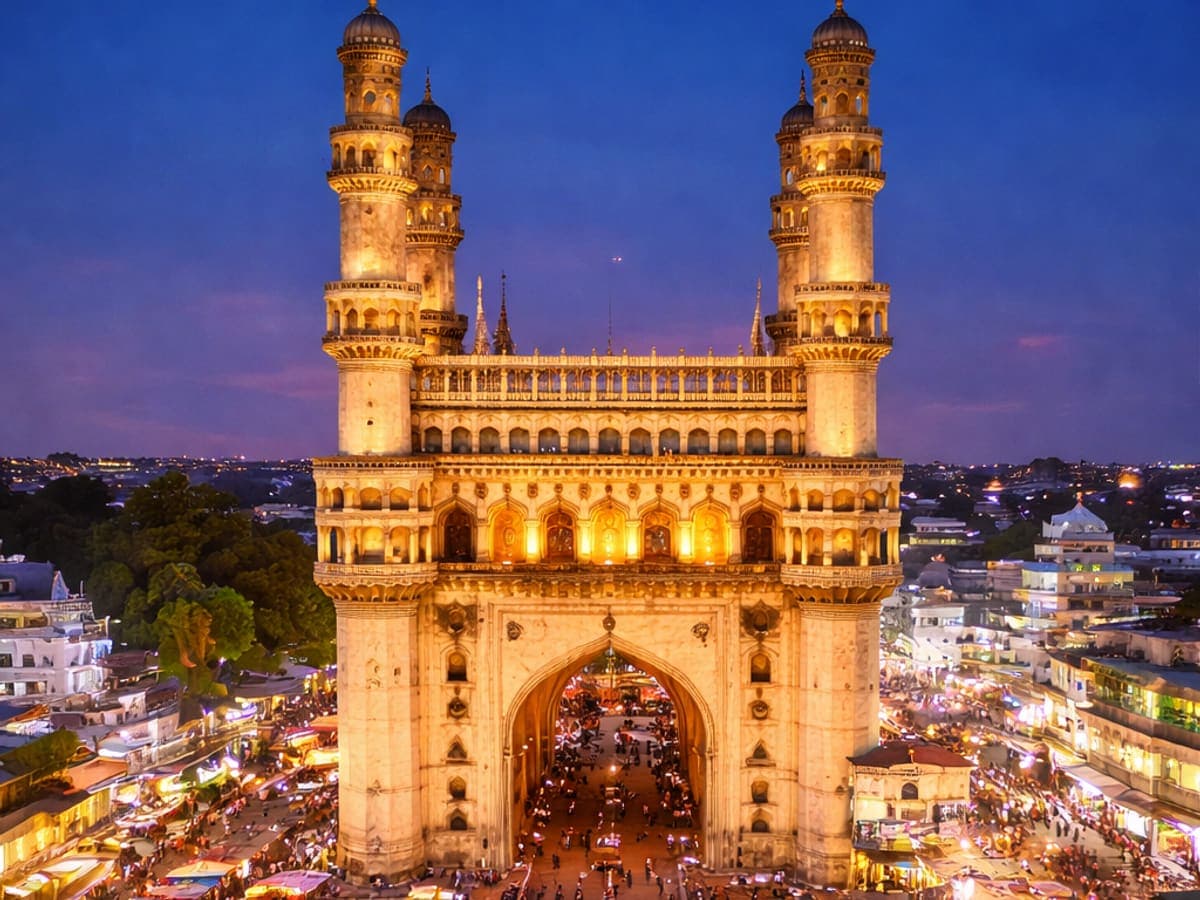 Charminar in Hyderabad at twilight, the market streets busy below